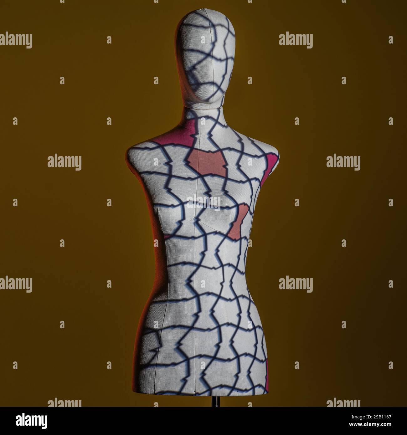 Mannequin illuminated with creative lights with geometric effects Stock Photo