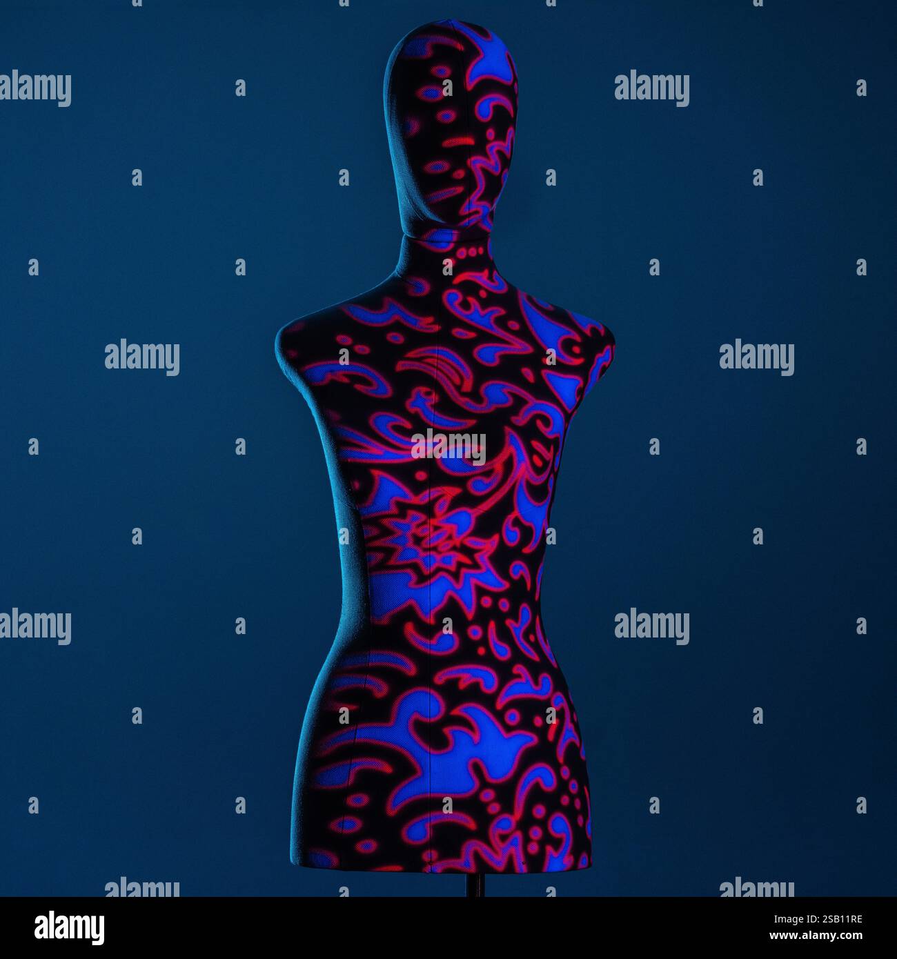 Mannequin illuminated with creative lights with geometric effects Stock Photo