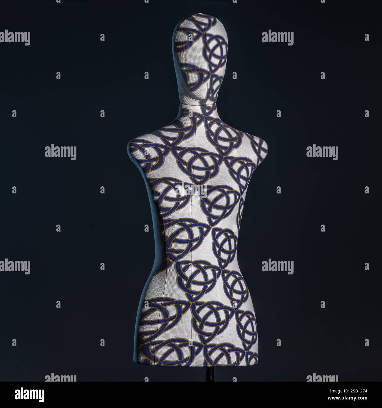 Mannequin illuminated with creative lights with geometric effects Stock Photo