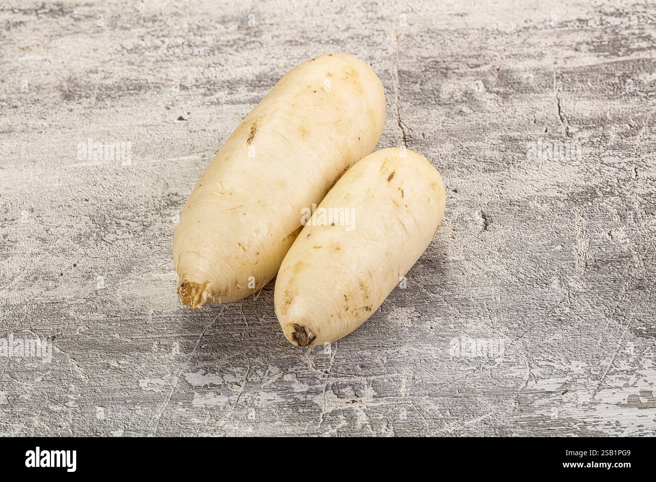 Raw white daikon raddish root for cooking Stock Photo - Alamy