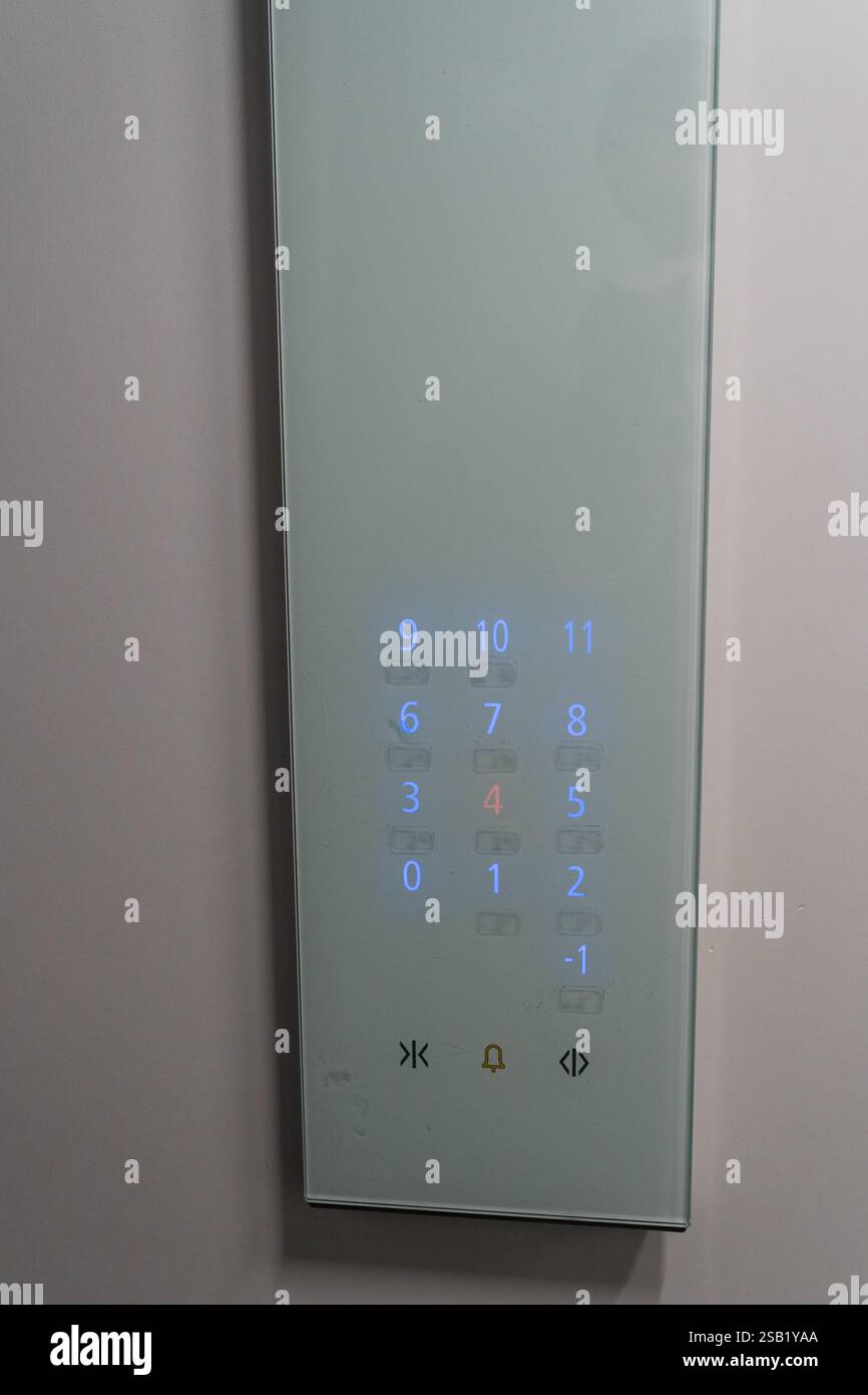 Closeup of glass button panel in an elevator background Stock Photo