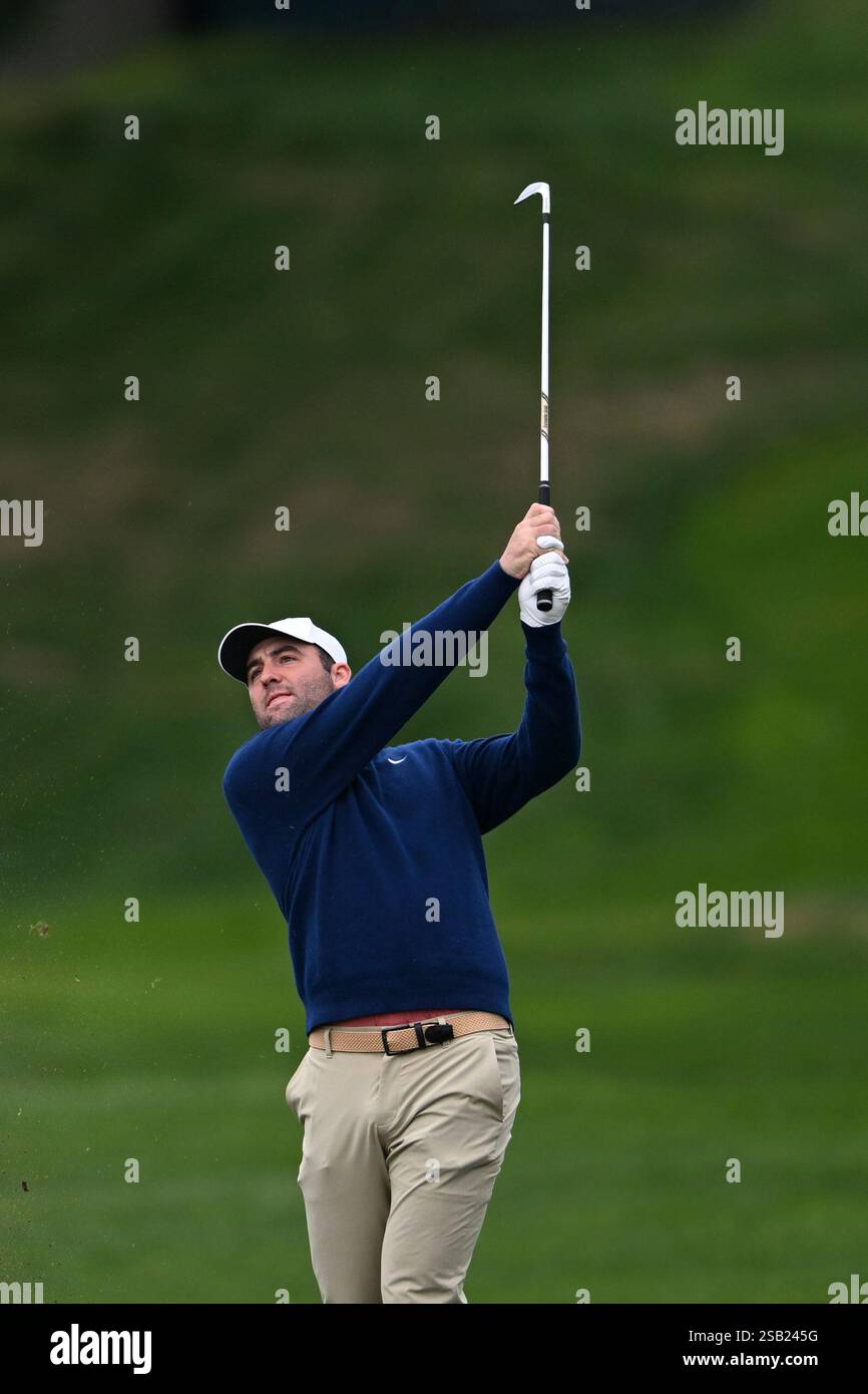 Scottie Scheffler hits from the fourth fairway at Pebble Beach Golf