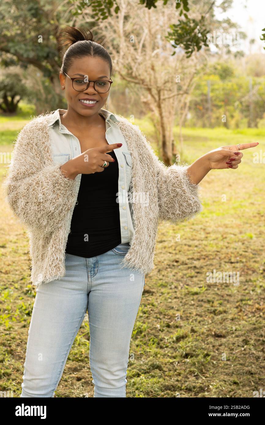 Woman in black outfit engaged hi-res stock photography and images - Alamy