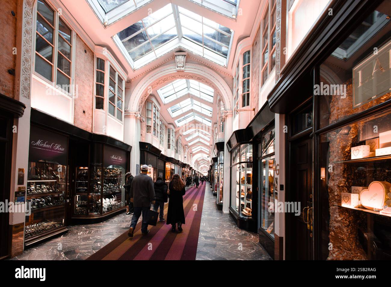 Burlington Arcade London UK; a 19th century shopping arcade crossing from Piccadilly to Burlington Gardens, London W1. London city centre shopping UK Stock Photo