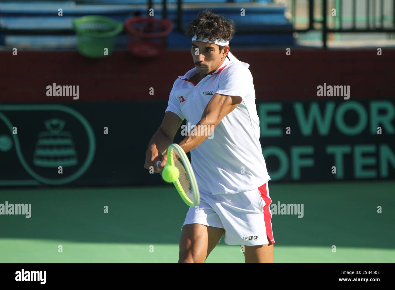 Tunis, Tunis, Tunisia, Tunisia. 31st Jan, 2025. TUNIS, TUNISIA - JANUARY 31: Moez Echargui of Tunisia returns the ball to Oleksandr Ovcharenko of Ukraine during Davis Cup World Group 1 match of the Europe and Africa Zone, at El Menzah Stadium in Tunisia, on 31 January, 2025. Credit: Hasan Mrad/ZUMA Press Wire/ZUMA Wire/Alamy Live News Stock Photo