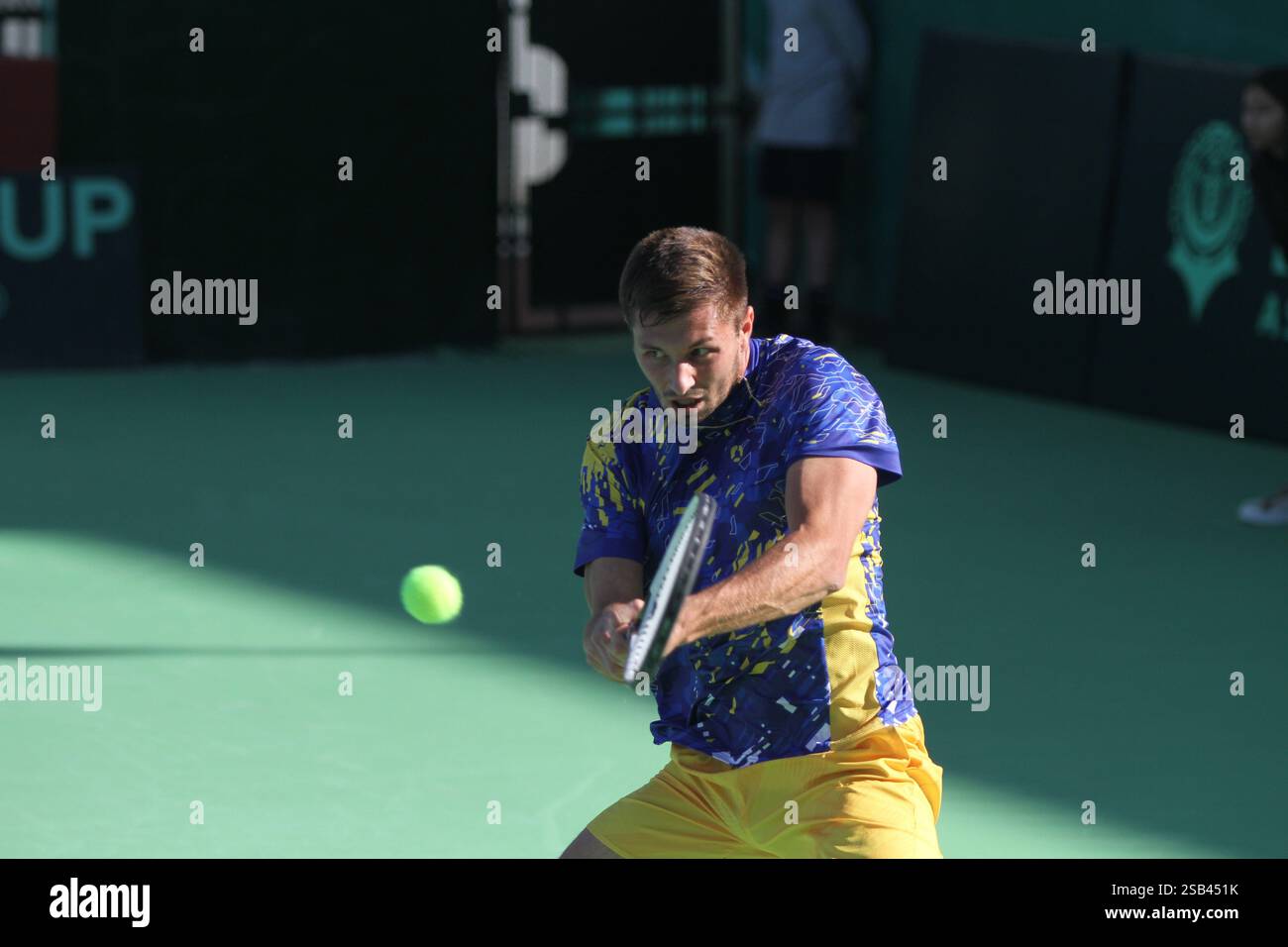Tunis, Tunis, Tunisia, Tunisia. 31st Jan, 2025. TUNIS, TUNISIA - JANUARY 31: Oleksandr Ovcharenko of Ukraine returns the ball to Moez Echargui of Tunisia during Davis Cup World Group 1 match of the Europe and Africa Zone, at El Menzah Stadium in Tunisia, on 31 January, 2025. Credit: Hasan Mrad/ZUMA Press Wire/ZUMA Wire/Alamy Live News Stock Photo