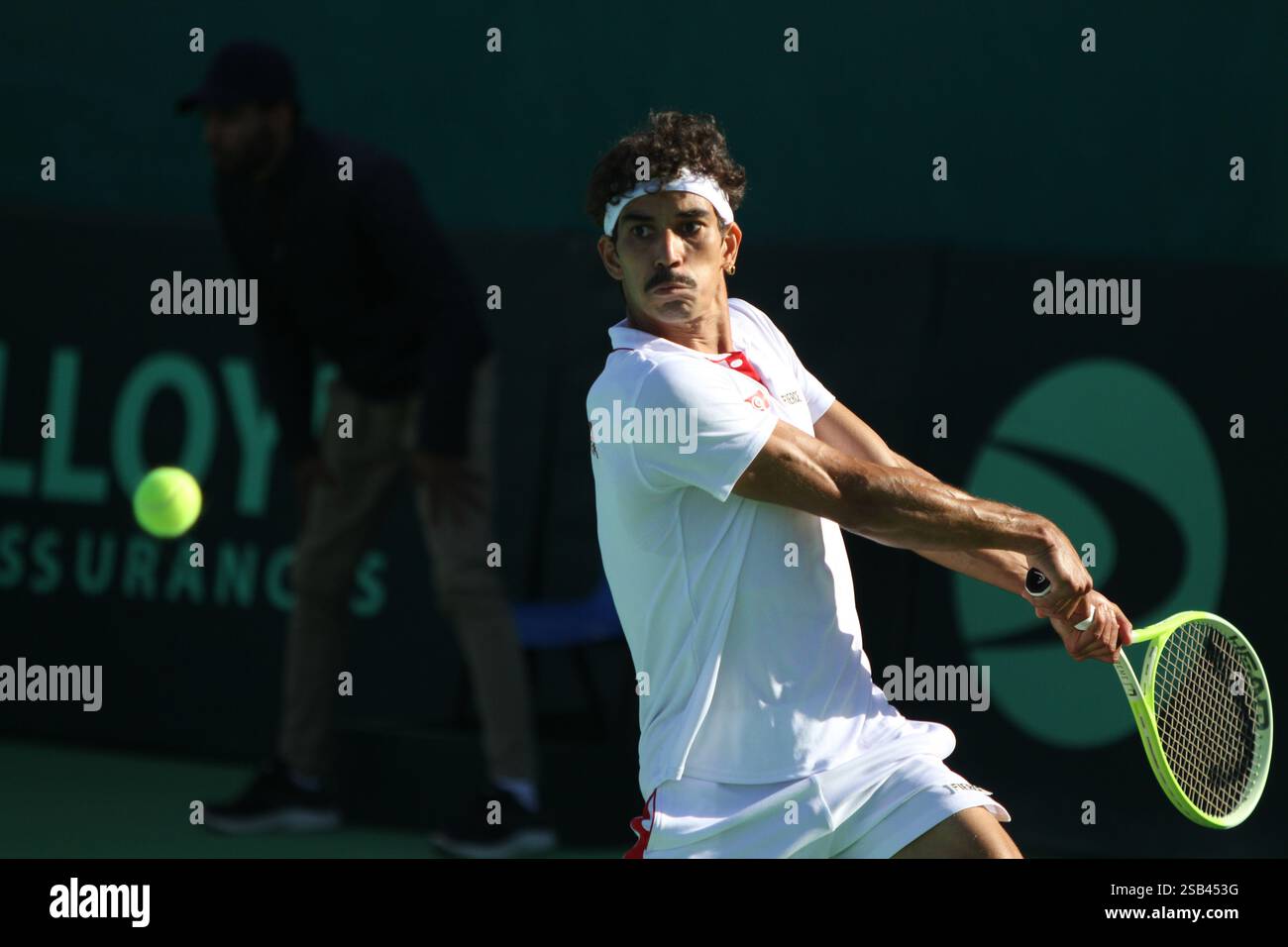Tunis, Tunis, Tunisia, Tunisia. 31st Jan, 2025. TUNIS, TUNISIA - JANUARY 31: Moez Echargui of Tunisia returns the ball to Oleksandr Ovcharenko of Ukraine during Davis Cup World Group 1 match of the Europe and Africa Zone, at El Menzah Stadium in Tunisia, on 31 January, 2025. Credit: Hasan Mrad/ZUMA Press Wire/ZUMA Wire/Alamy Live News Stock Photo