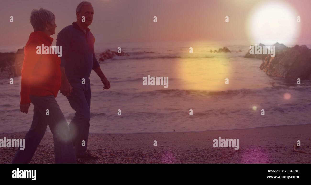 Couple walking on the beach at sunset hi-res stock photography and images -  Page 3 - Alamy, image size:1300x775