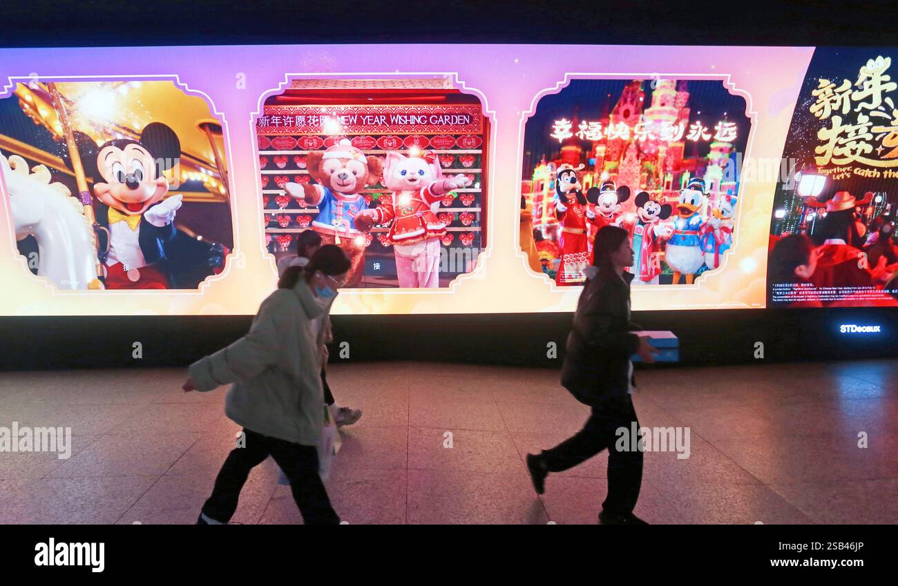 SHANGHAI, CHINA JANUARY 29, 2025 People walk past a subway