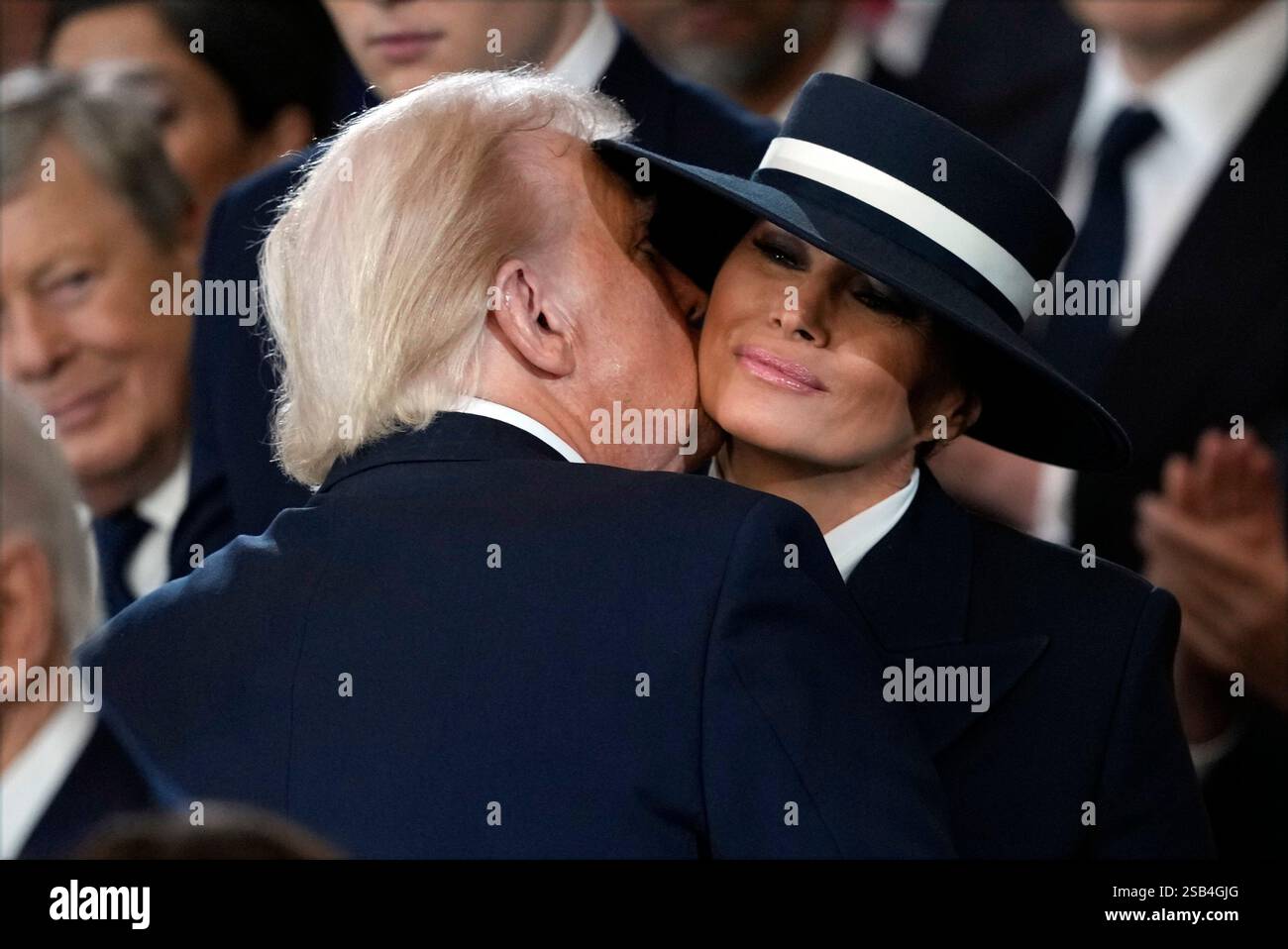U.S. President Donald Trump kisses his wife first lady Melania Trump
