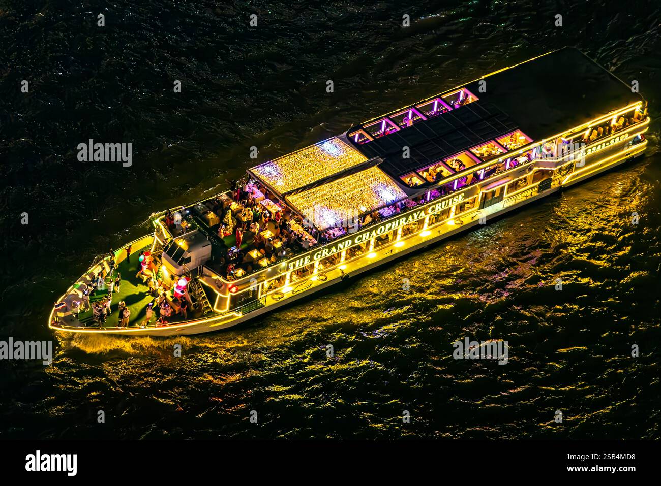 Riverboat dinner cruise at night on Chao Phraya river, Bangkok