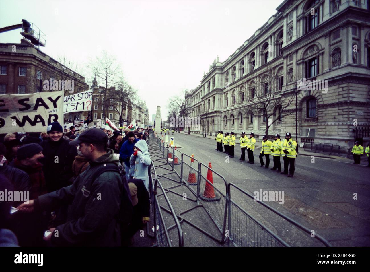 Anti war demonstration in central London in 2003 with riot police ...