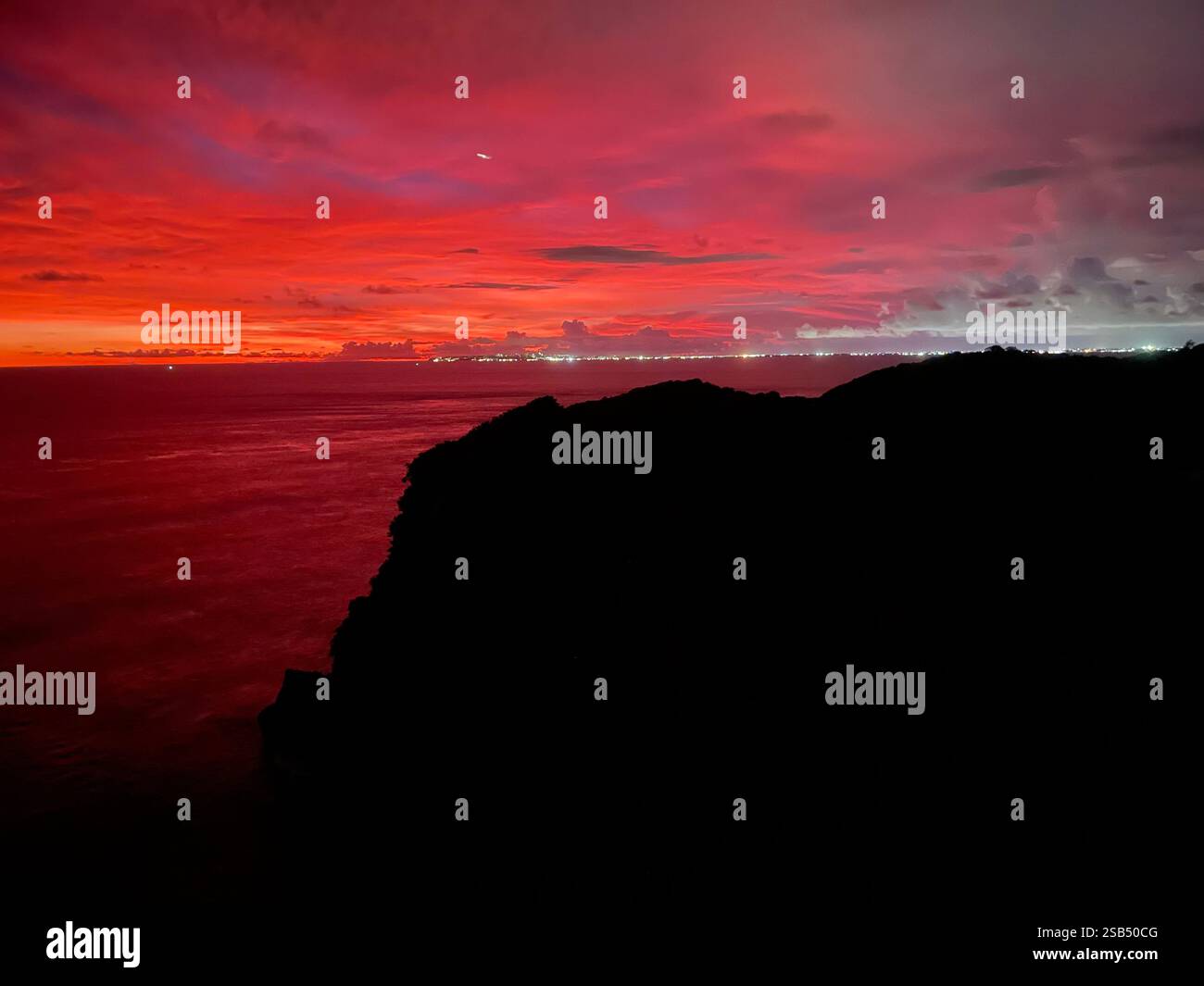 Incredible sunset views of Nusa Penida island in Bali, Indonesia - Smartphone Captured Stock Image