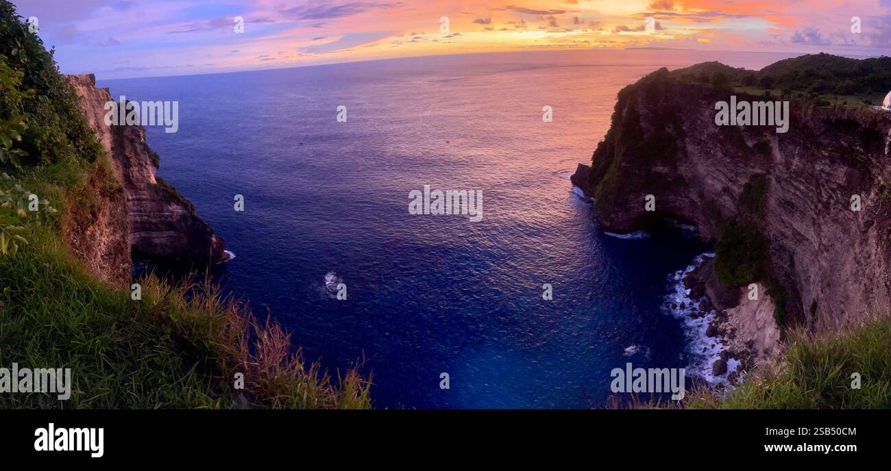 Incredible sunset views of Nusa Penida island in Bali, Indonesia - Smartphone Captured Stock Image