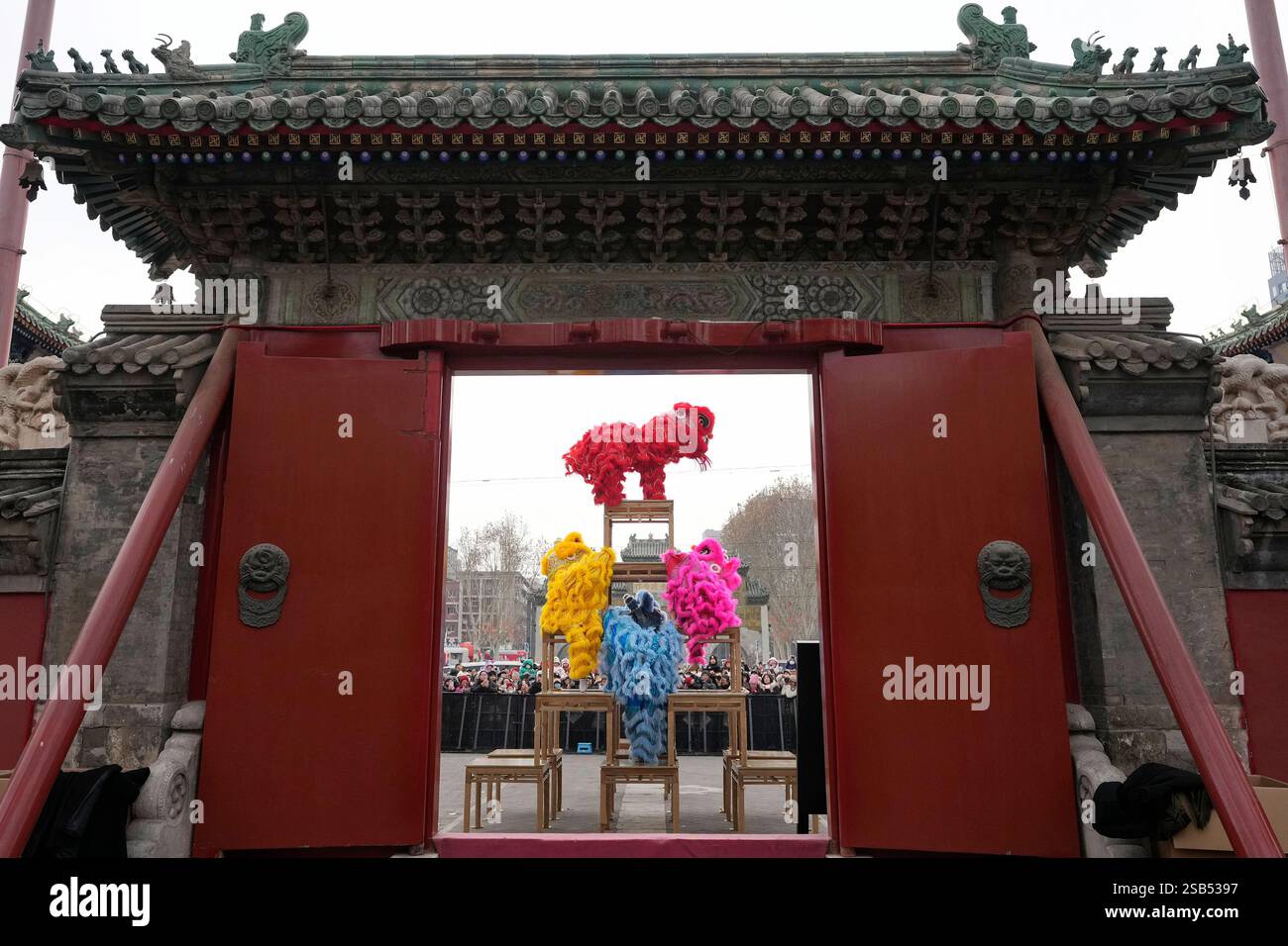 Lion acrobatic dancers perform at the Dongyue Temple Fair on the fourth