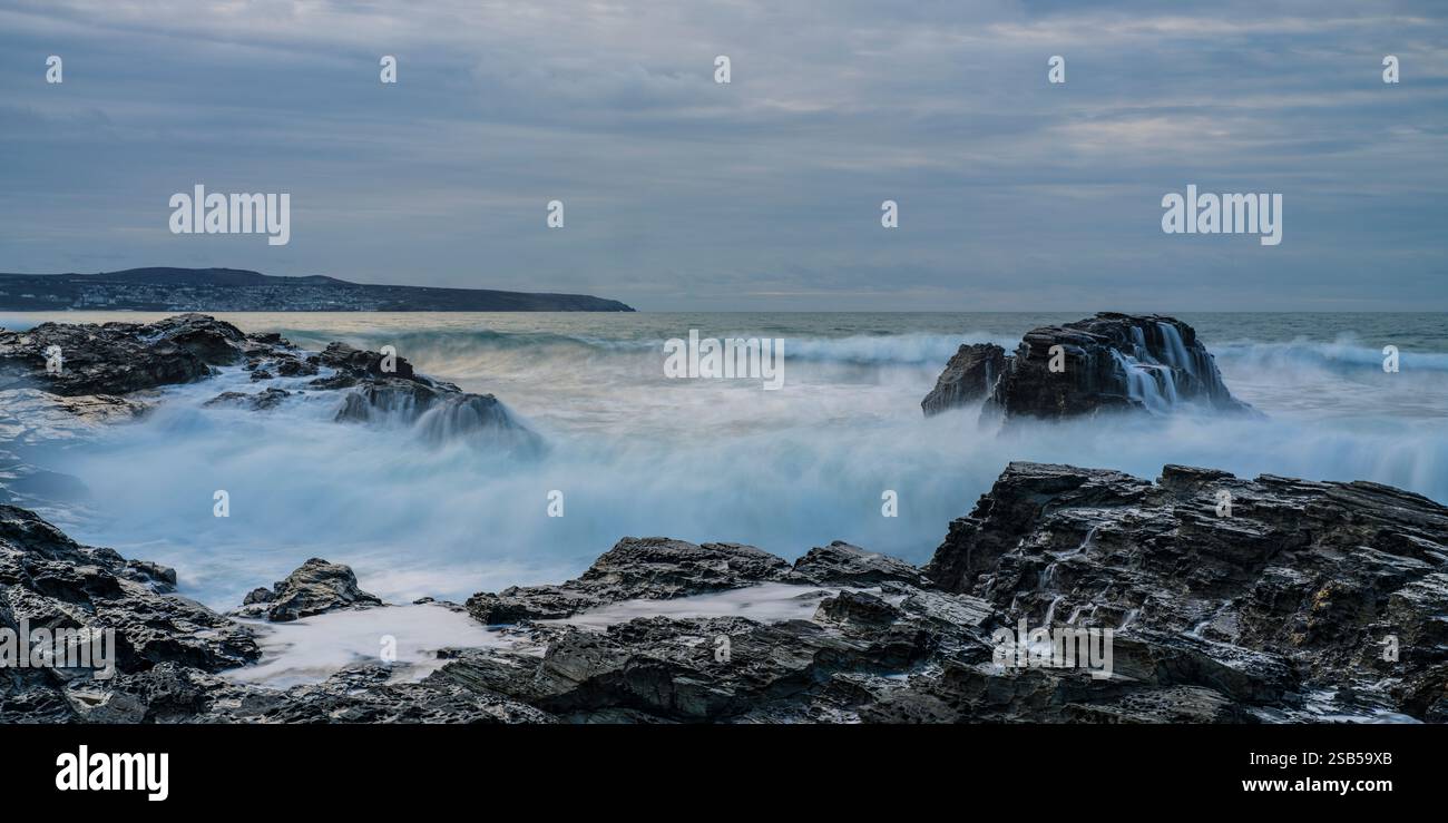 GODREVY ROCKS AND ROUGH SEA WAVES BREAKING OVER ROCKS Stock Photo - Alamy
