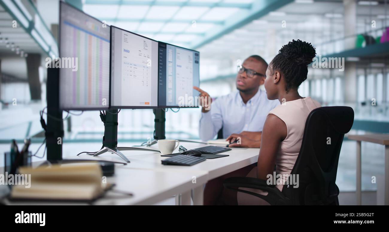 Analyst Working With Spreadsheet Business Data On Computer Stock Photo