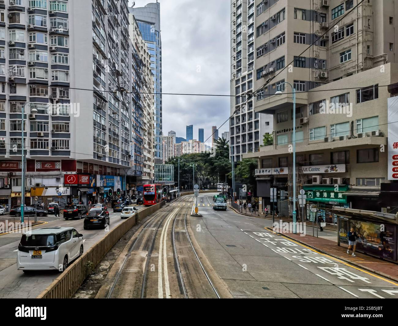 Bustling street scene depicts hi-res stock photography and images - Alamy