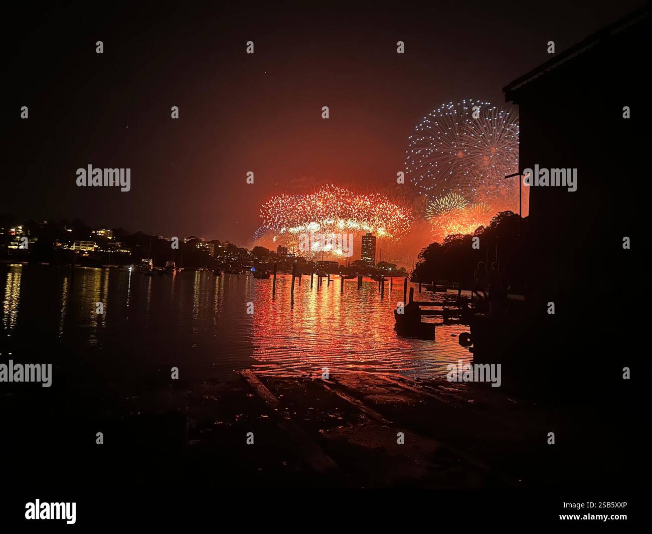 New Years fireworks above Sydney harbour bridge for 2025 January fireworks. - Smartphone Captured Stock Image