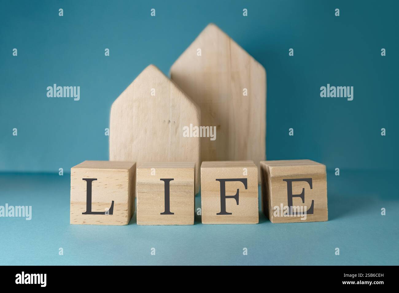 Wooden block with the letters LIFE on it. The blocks are arranged in a ...
