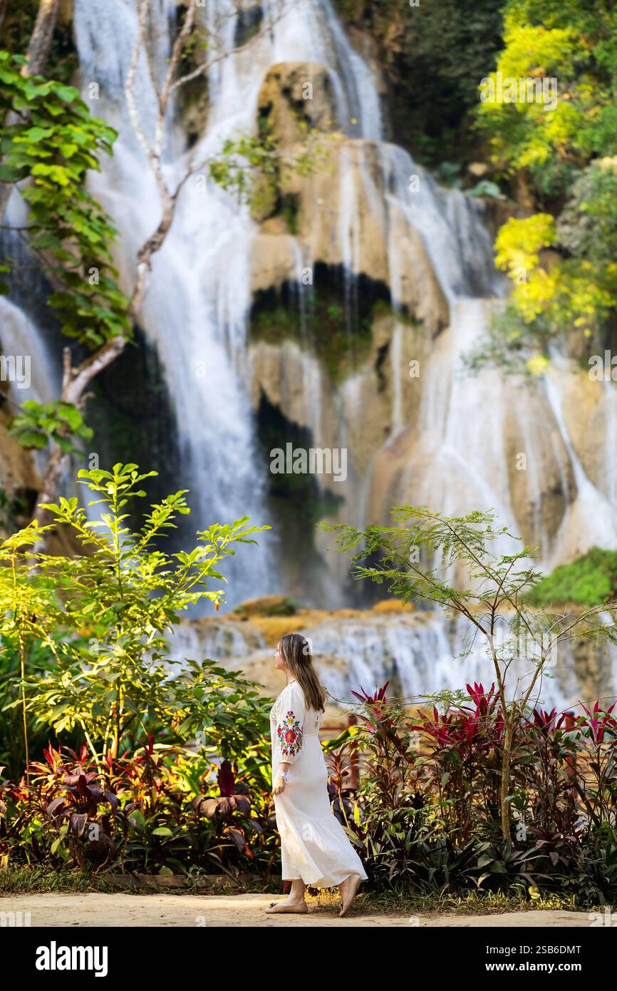 Woman walks through lush greenery hi-res stock photography and images ...