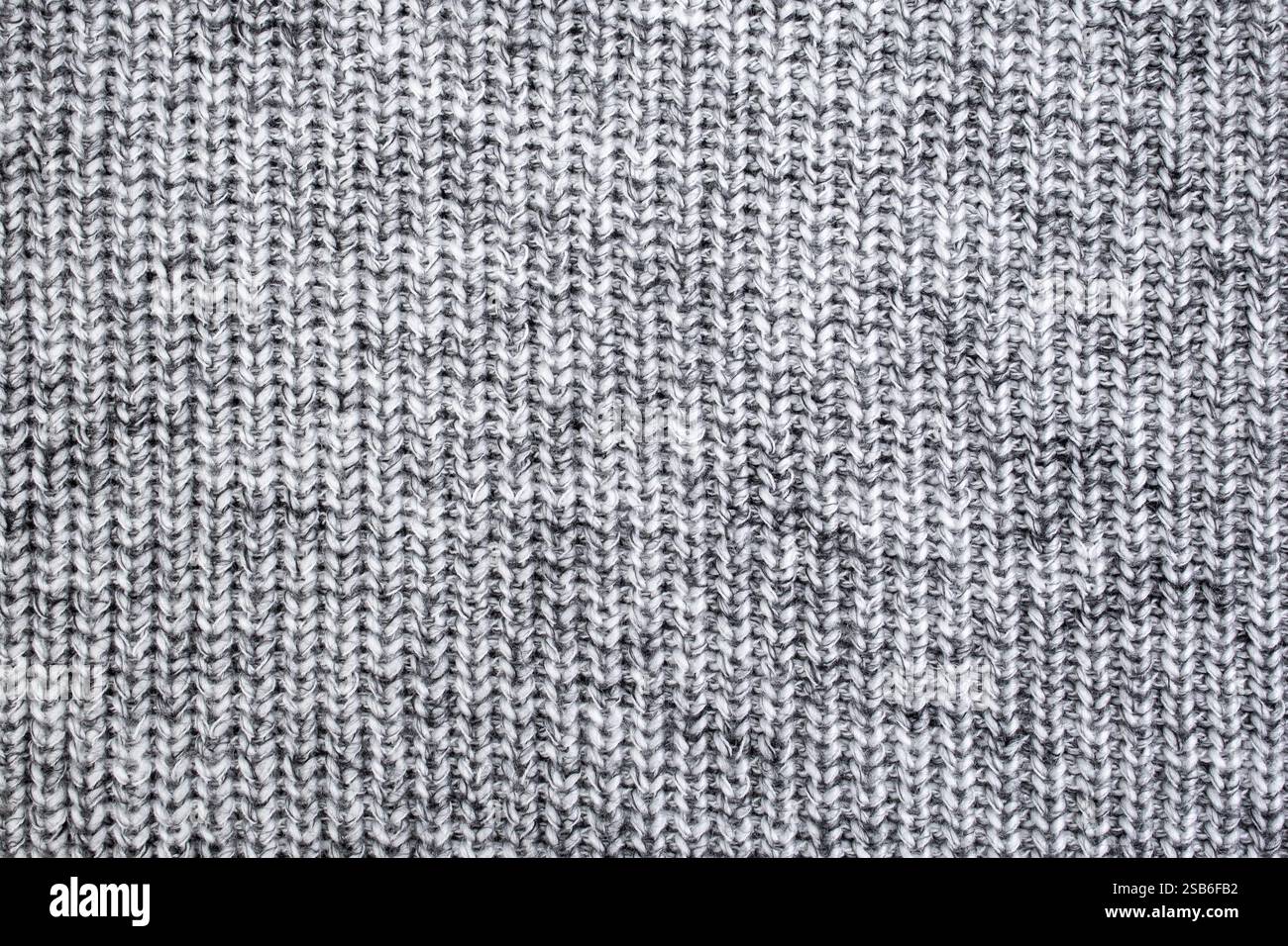 Knitted pullover fabric , soft wool thread pattern, vertical lines ...