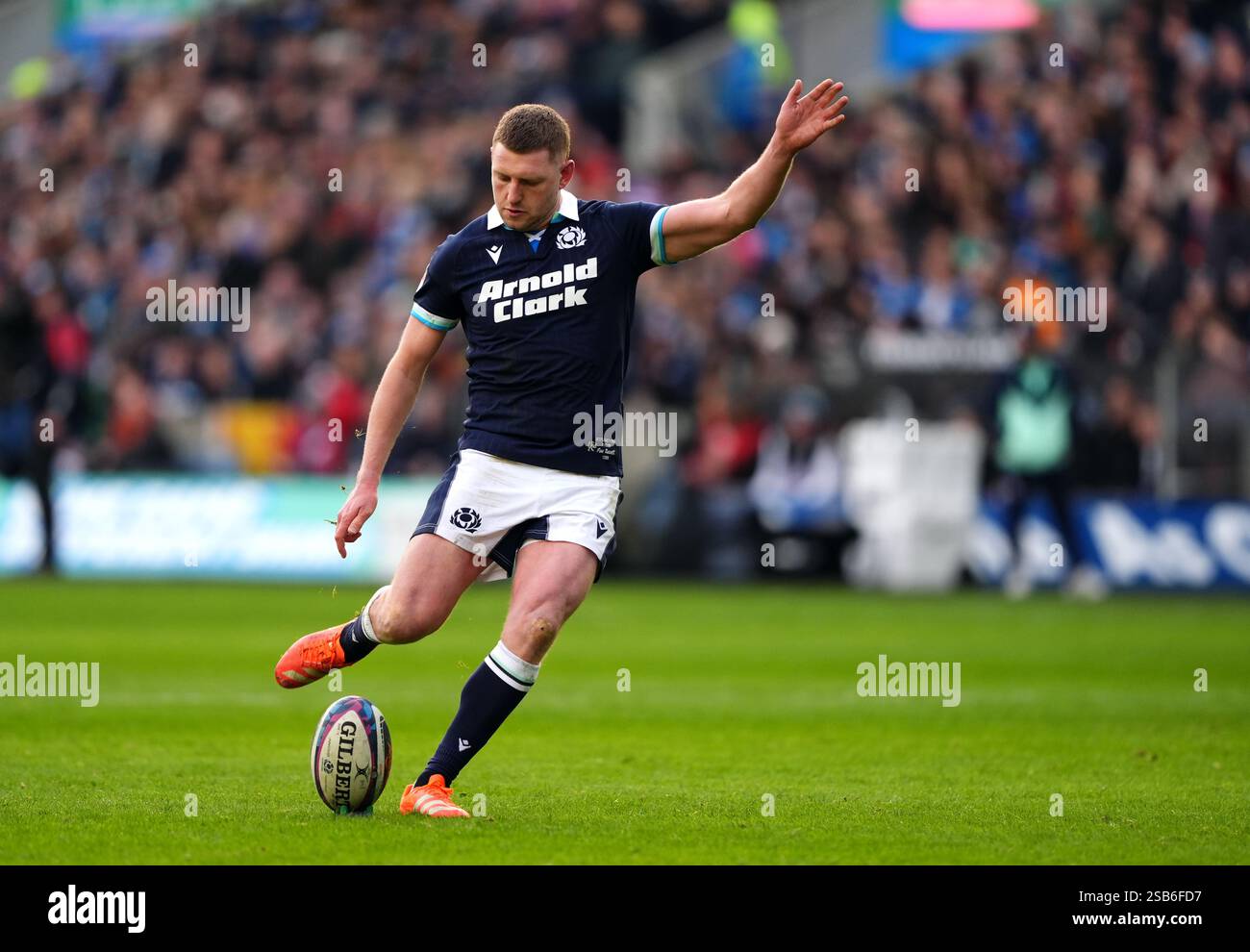 Scotland's Finn Russell kicks a conversion during the Guinness Six