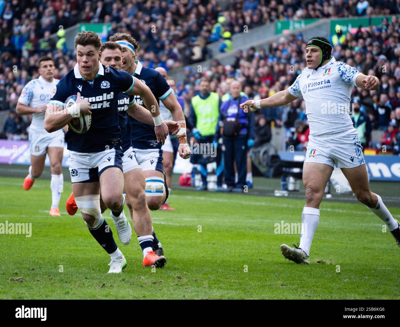 13. Huw Jones runs off to score against Italy in the Scotland vs Italy