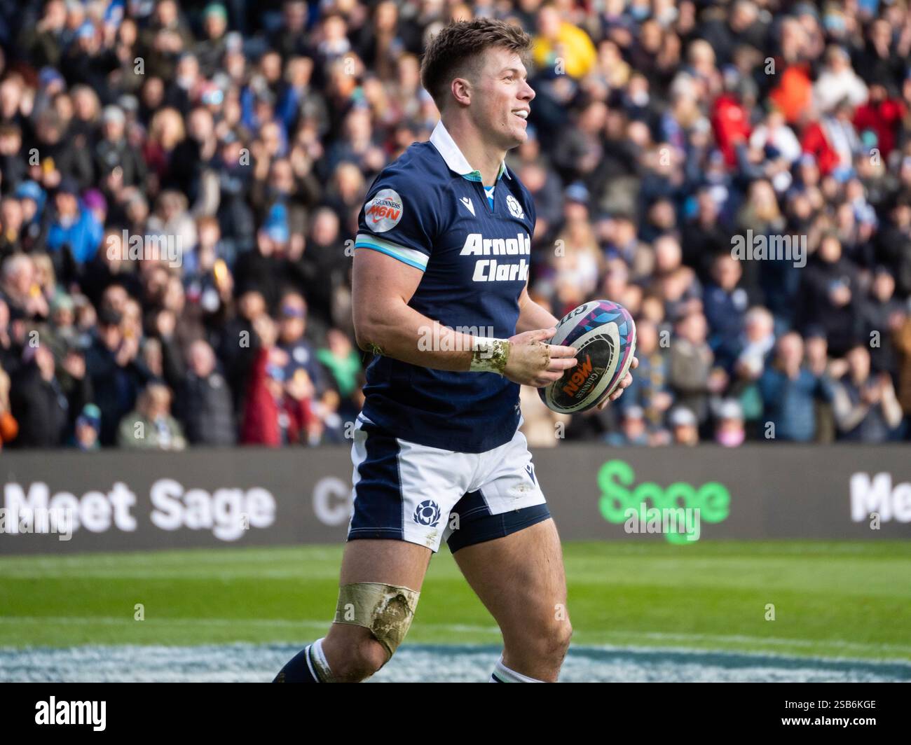 13. Huw Jones looks back after scoring against Italy in the Scotland vs