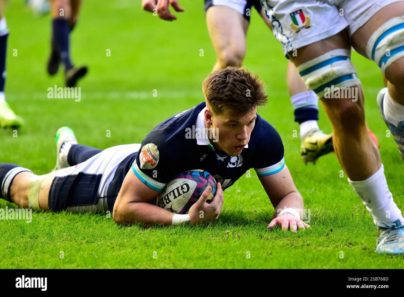 Scotland , UK.1 Feb, 2025. Huw Jones of Scotland gets a try Guinness