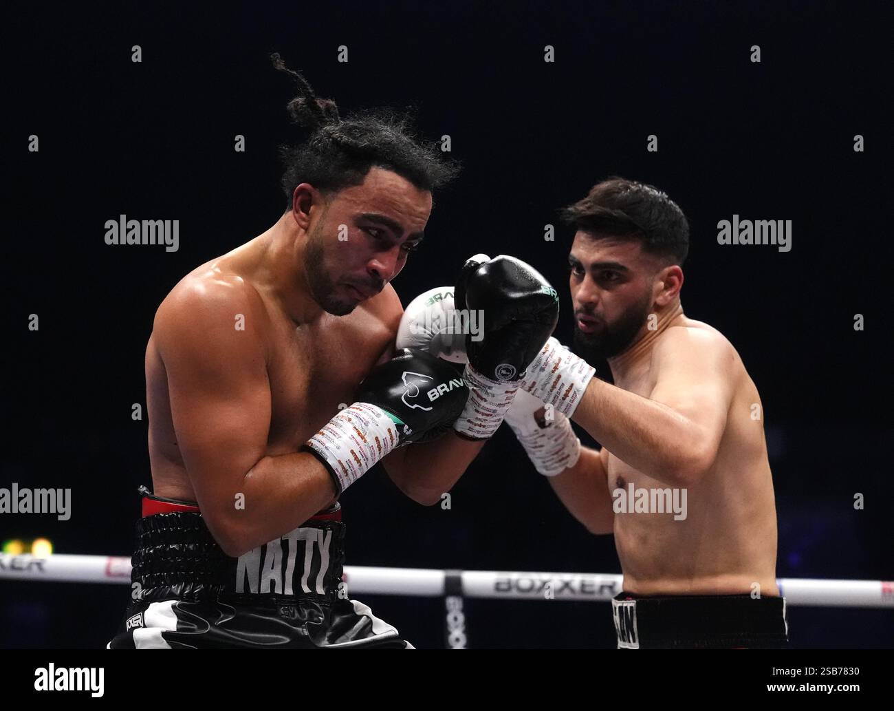 Hassan Azim (right) and Jensen Irving in the middle weight bout at the ...