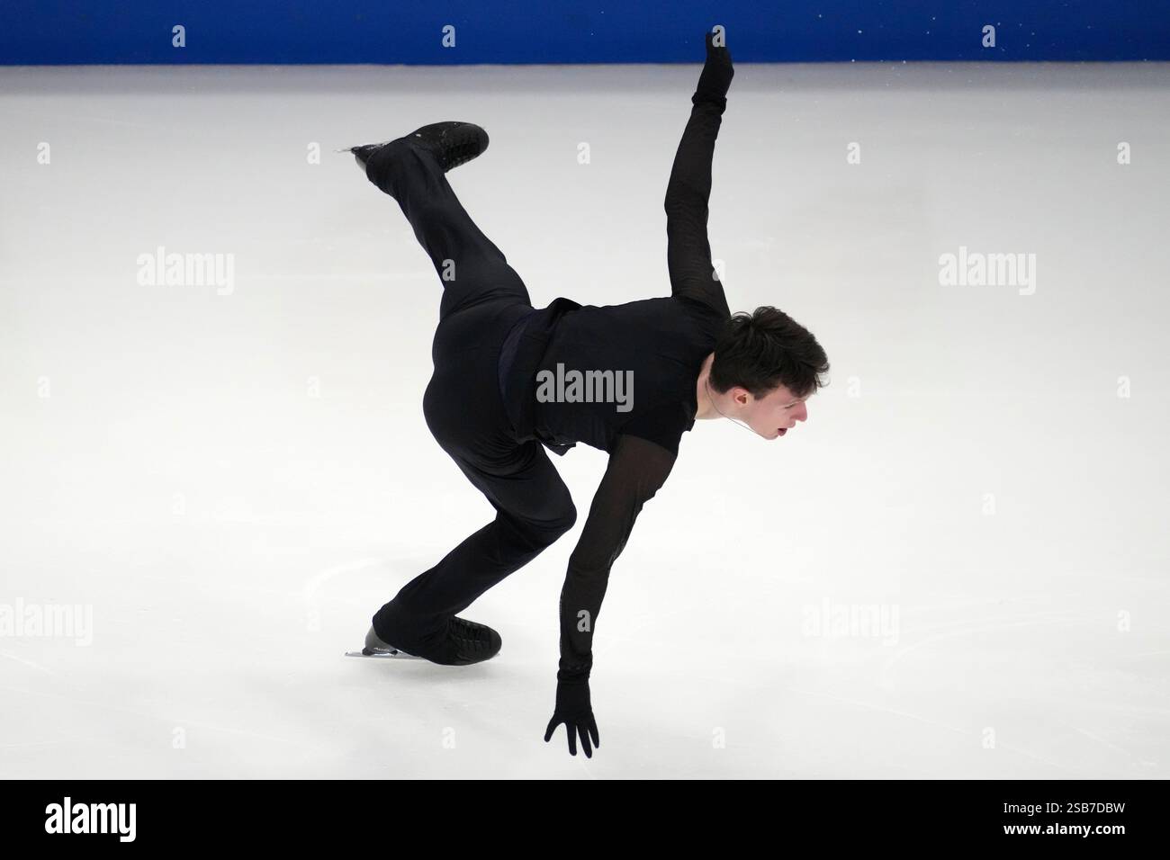 Fedir Kulish of Latvia performs during the men's free skating program