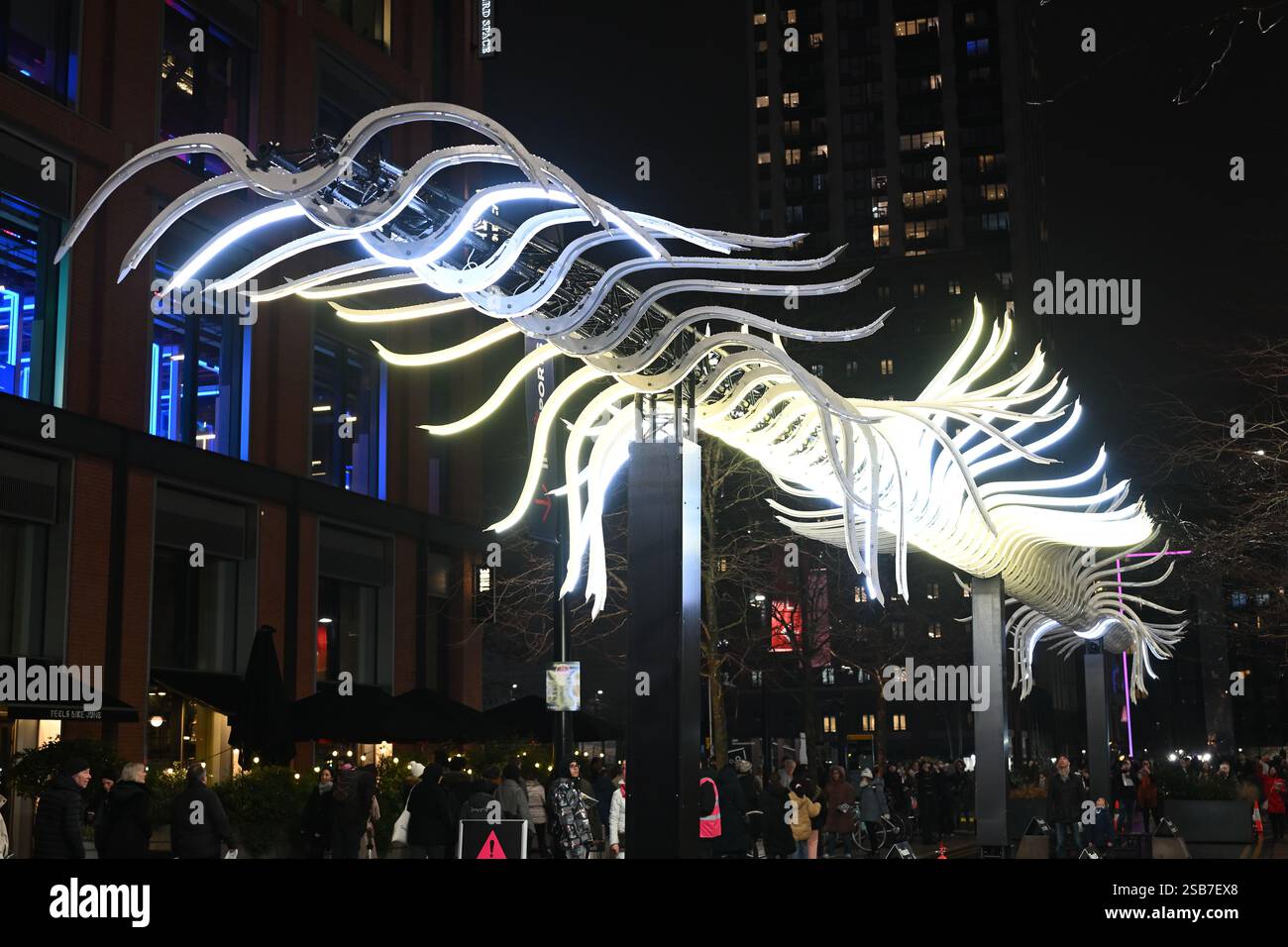 Bird Passing By installation by Luminariste with Benjamin Nesme & Marc Sicard at the Canary Wharf Winter Lights festival in London UK Stock Photo