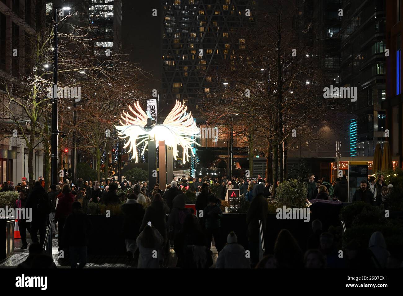 Bird Passing By installation by Luminariste with Benjamin Nesme & Marc Sicard at the Canary Wharf Winter Lights festival in London UK Stock Photo