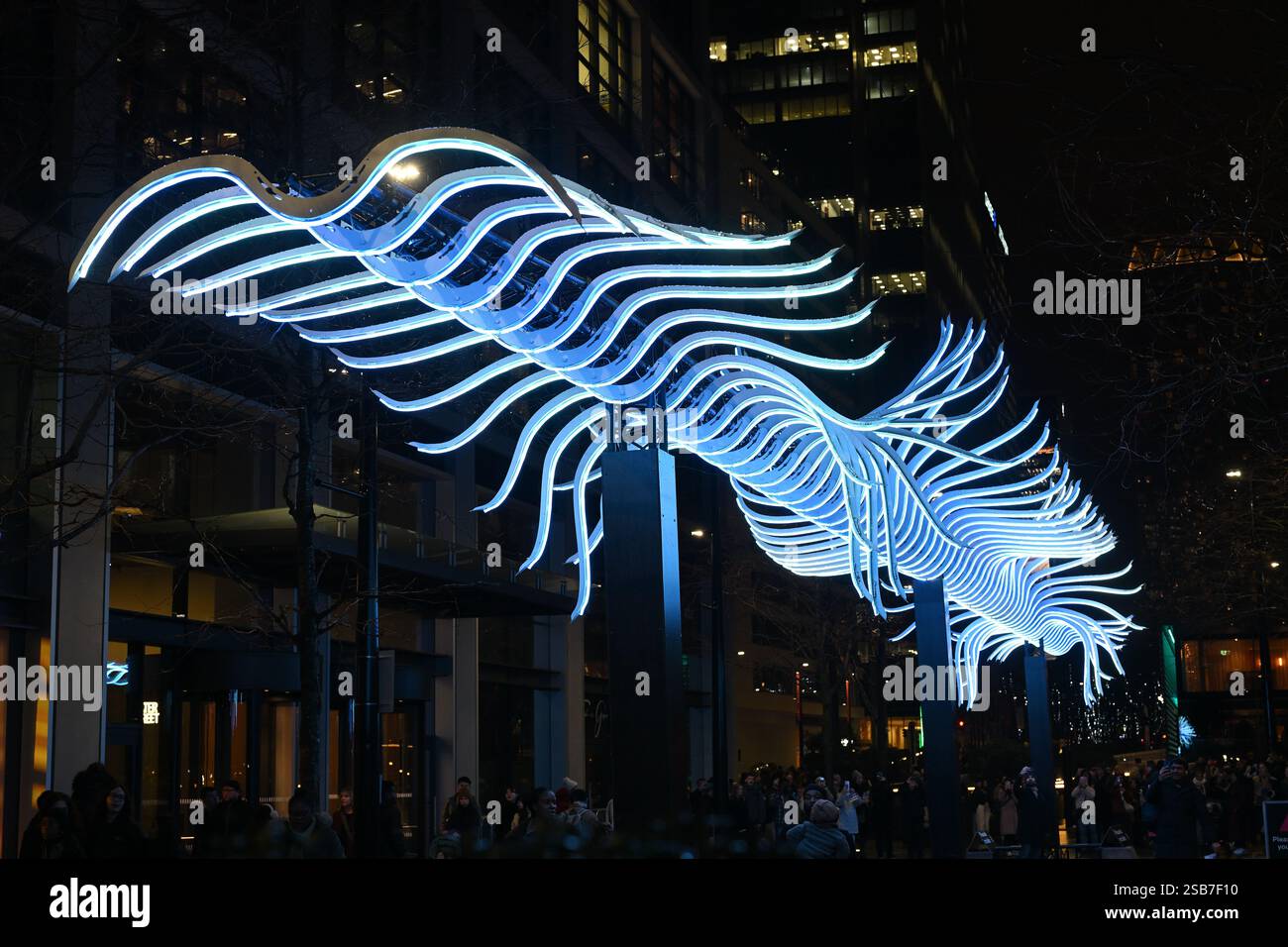 Bird Passing By installation by Luminariste with Benjamin Nesme & Marc Sicard at the Canary Wharf Winter Lights festival in London UK Stock Photo