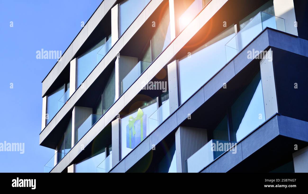 Picture of Large glass windows in a modern residential building. Modern urban ...