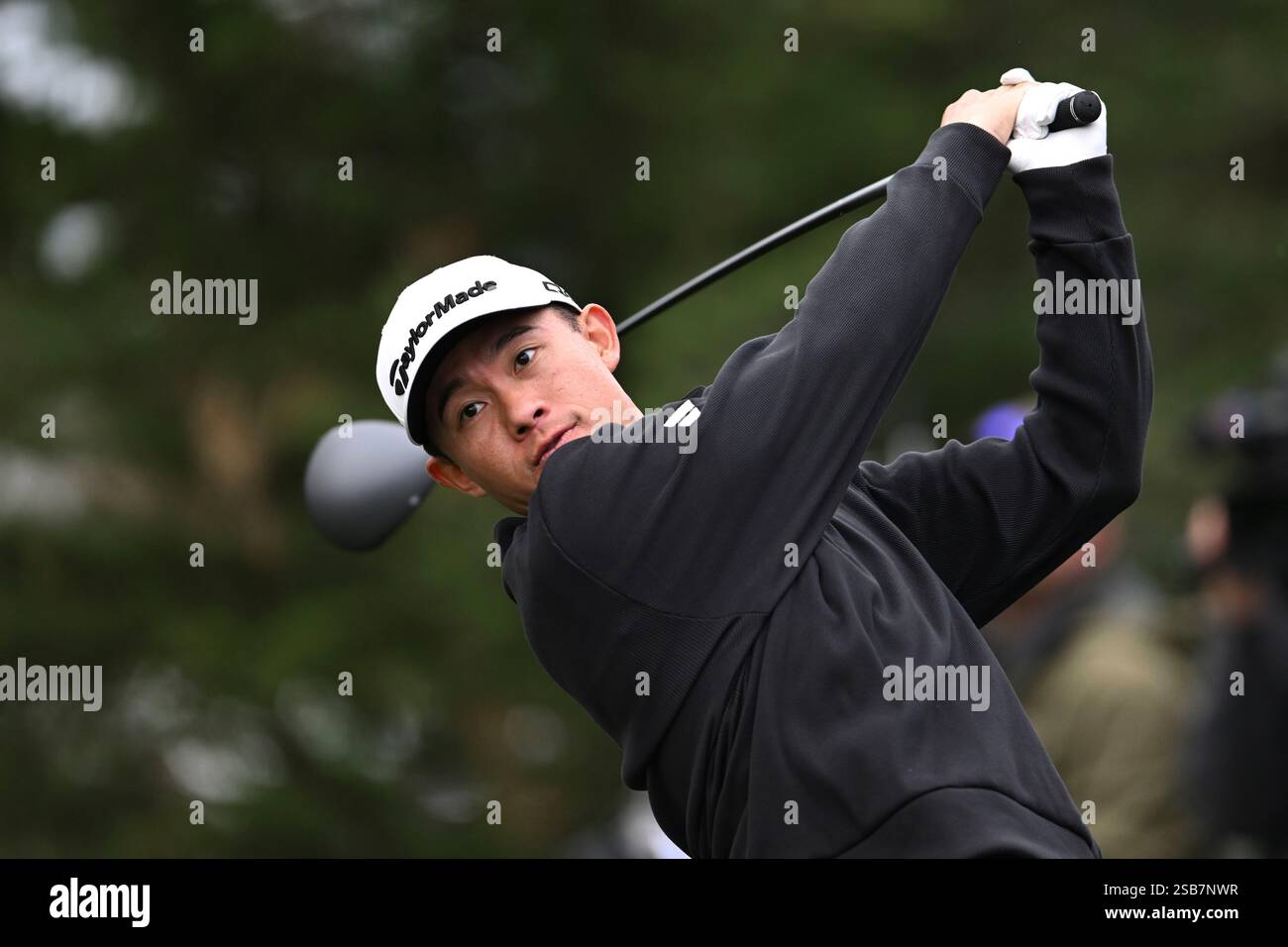 Collin Morikawa hits a tee shot on the second hole at Pebble Beach Golf