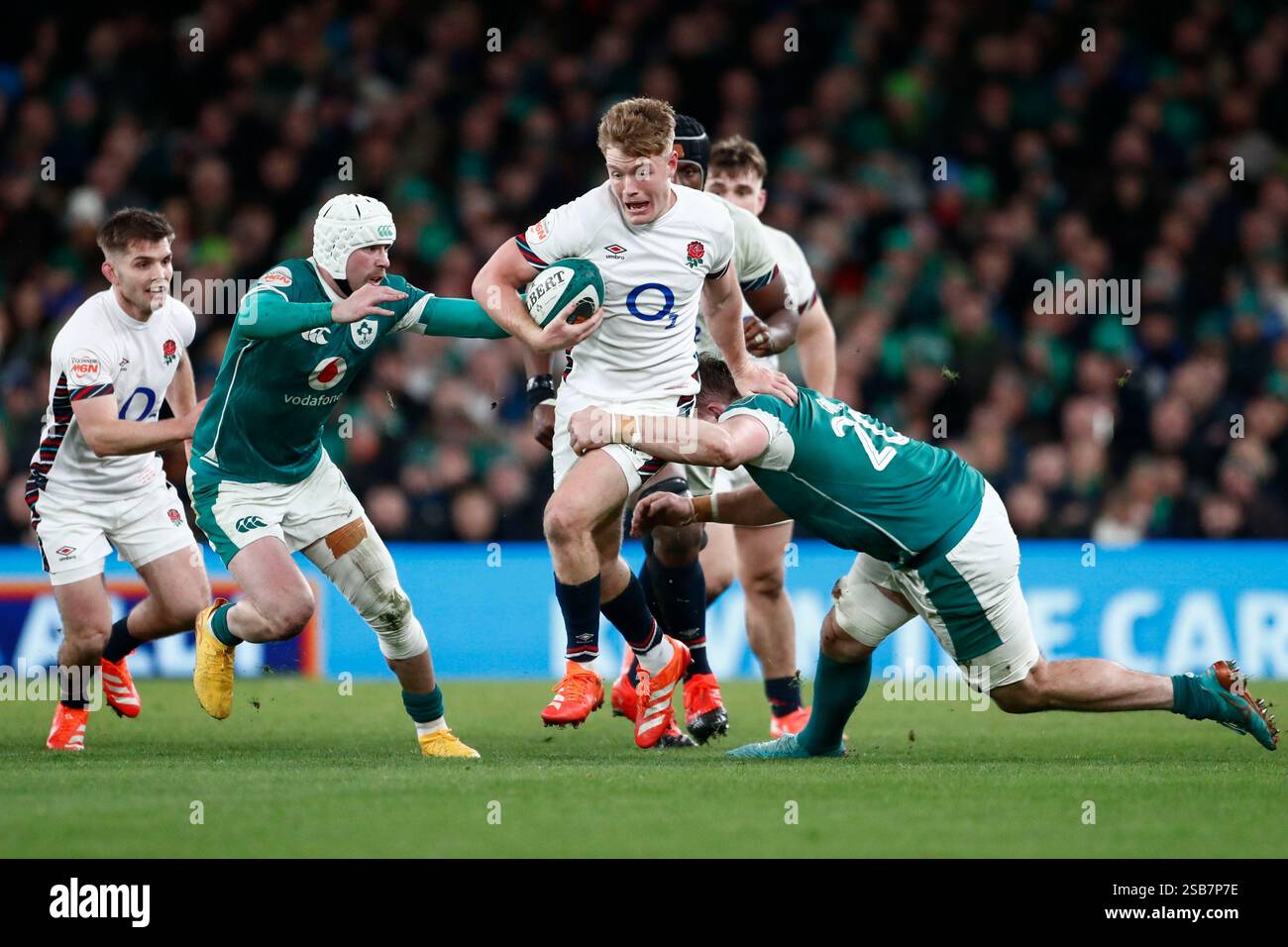 England's Fin Smith runs with the ball during the Six Nations rugby