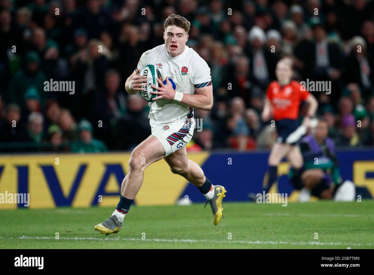 England's Tommy Freeman runs in to score a try during the Six Nations ...