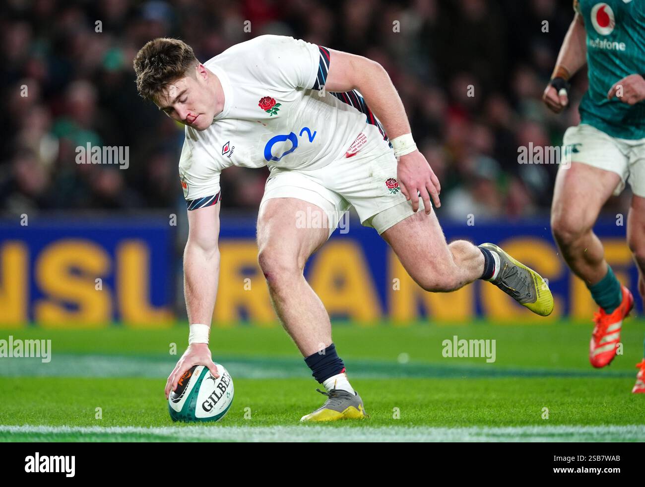 England's Tommy Freeman scores their side's third try of the game