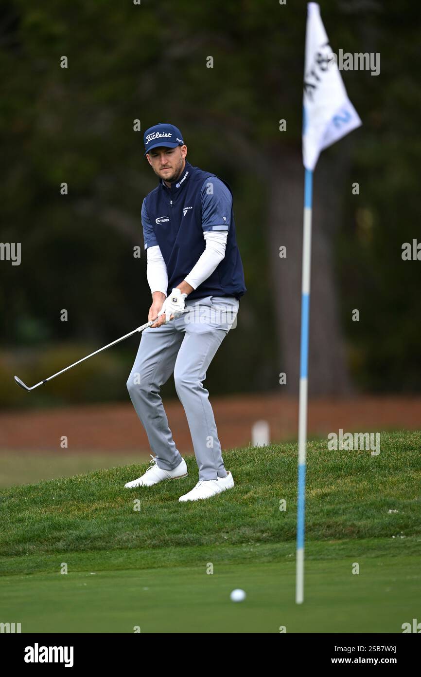 Lee Hodges watches his shot on the second green at Pebble Beach Golf