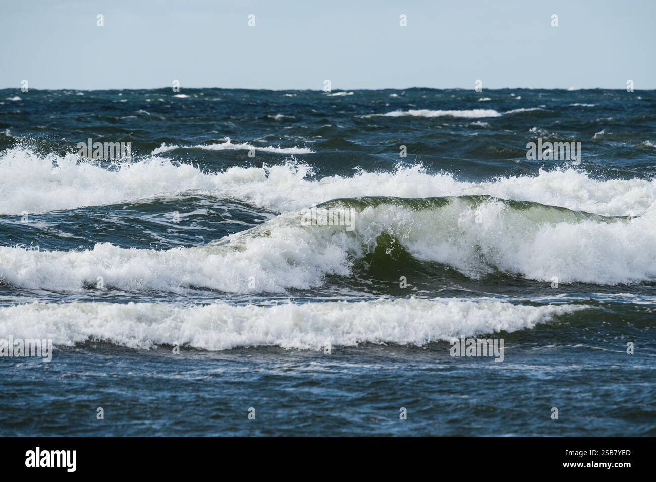 Untamed power of nature: The stormy Baltic Sea with high waves in Estonia. Stock Photo
