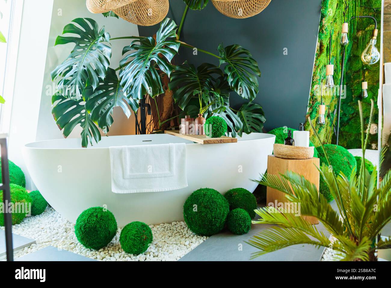 Image showcasing Luxury eco-friendly bathroom with lush plants Stock Photo - Alamy