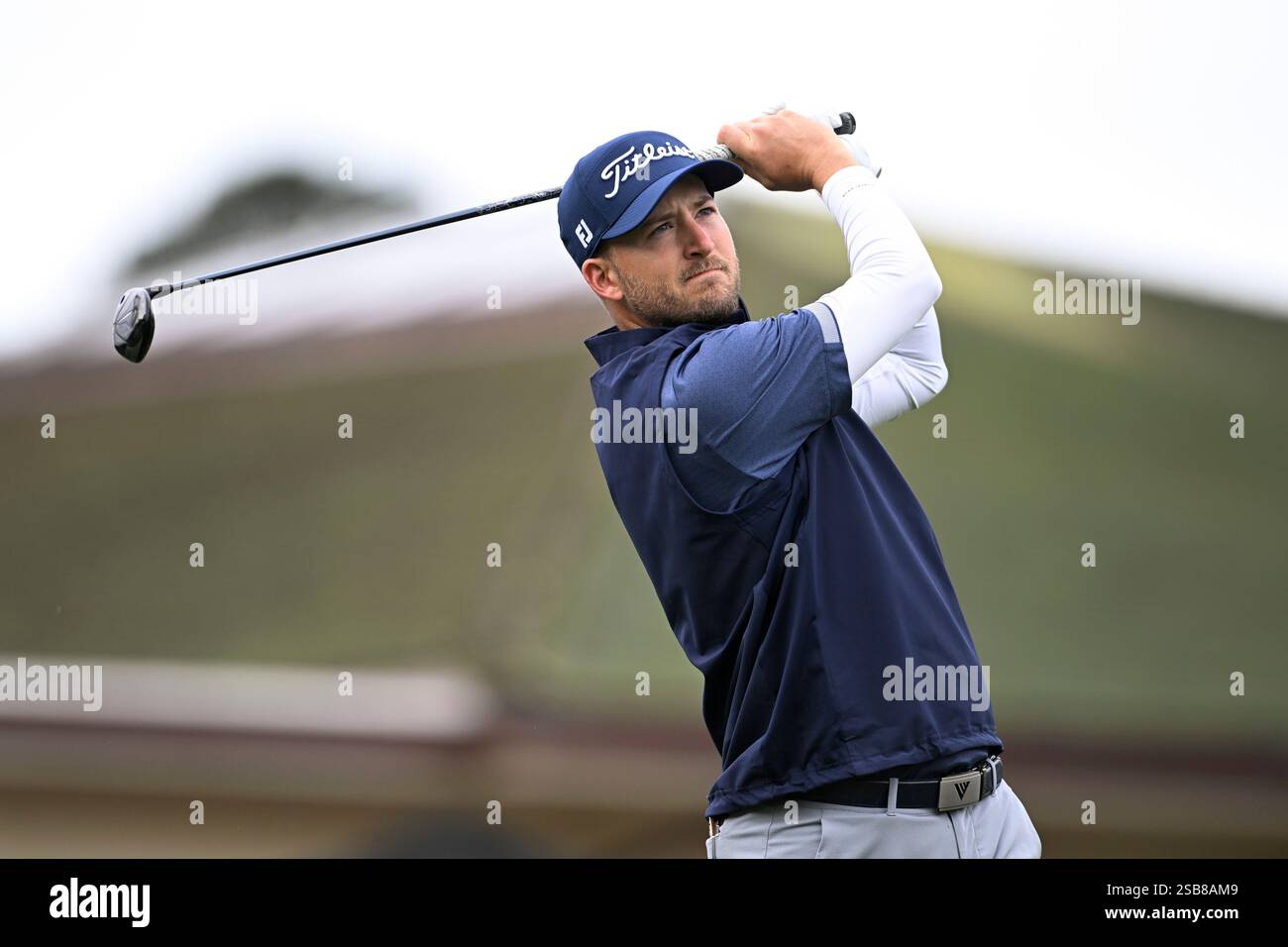 Lee Hodges hits his tee shot on the first hole at Pebble Beach Golf
