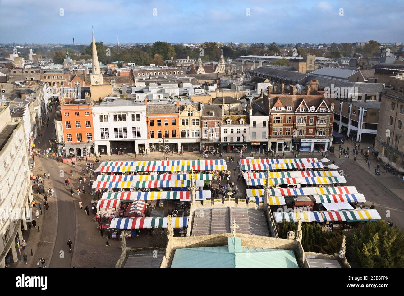 Easterly view from the top of Great St Mary's Church tower overlooking historic buildings and Cambridge market square in the city centre, England, UK Stock Photo