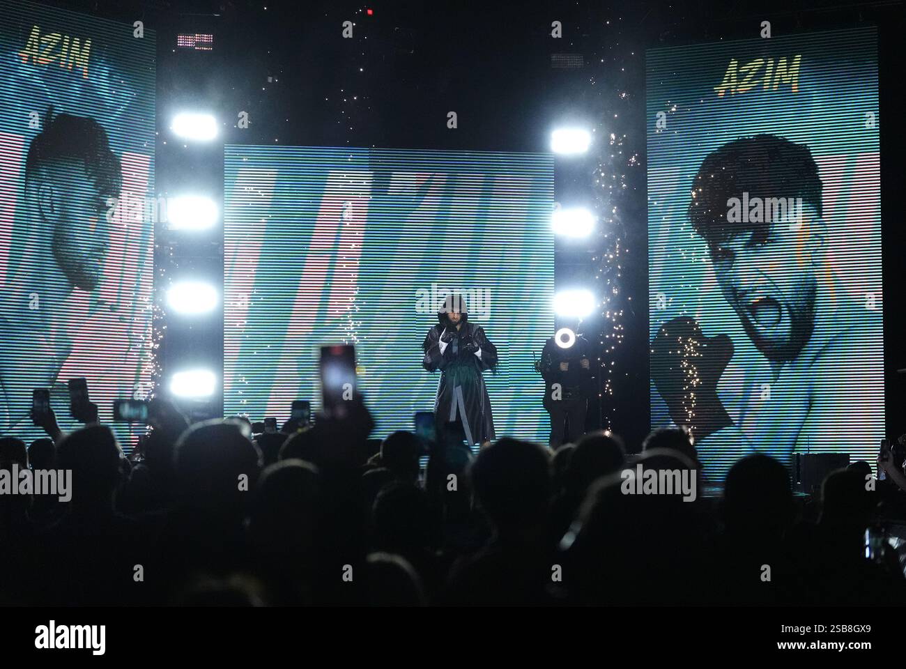 Adam Azim walks on ahead of the IBO World Super Light weight bout ...