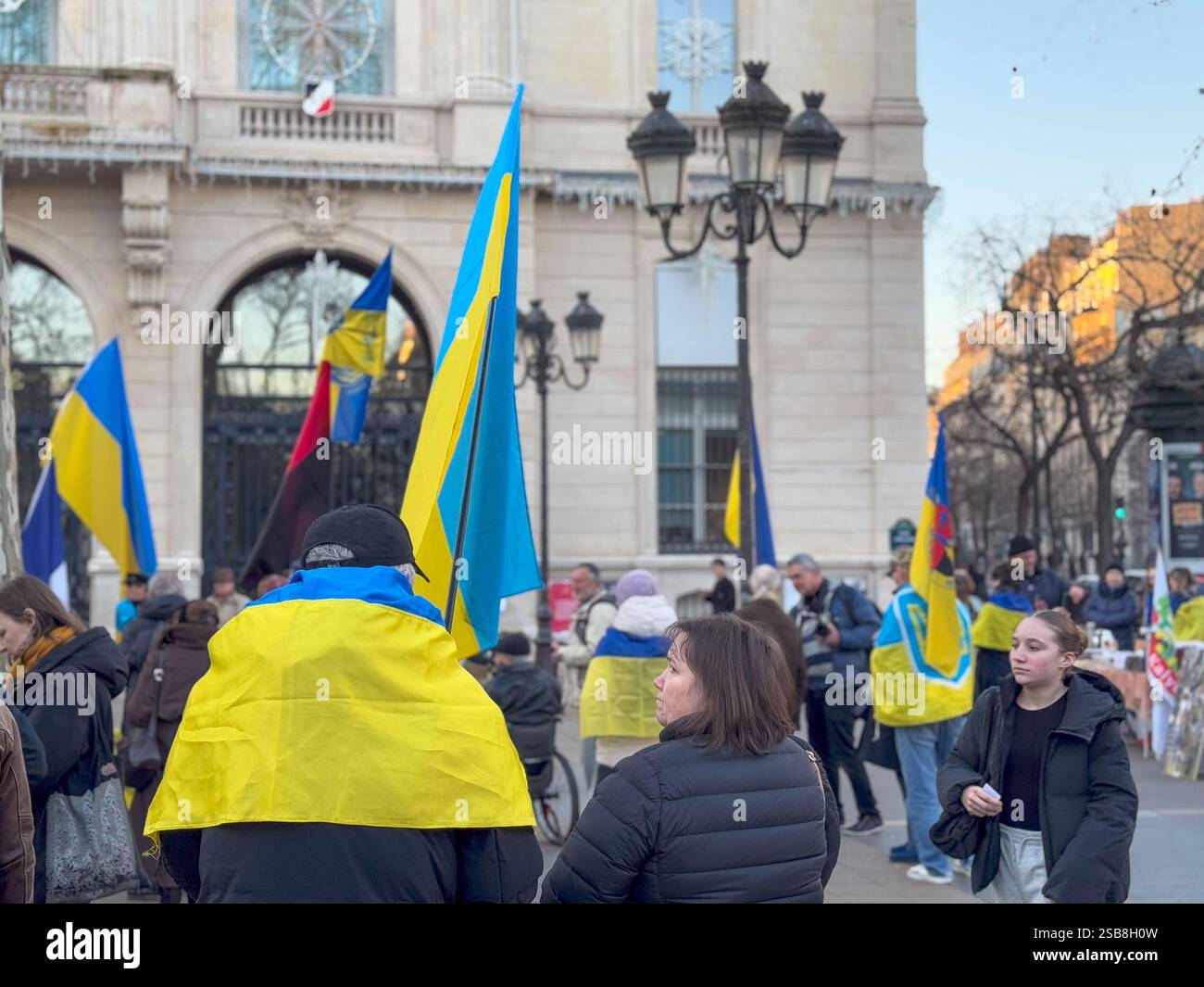 Crowds gather in unity for Ukrainian cause in vibrant city square rally Stock Photo