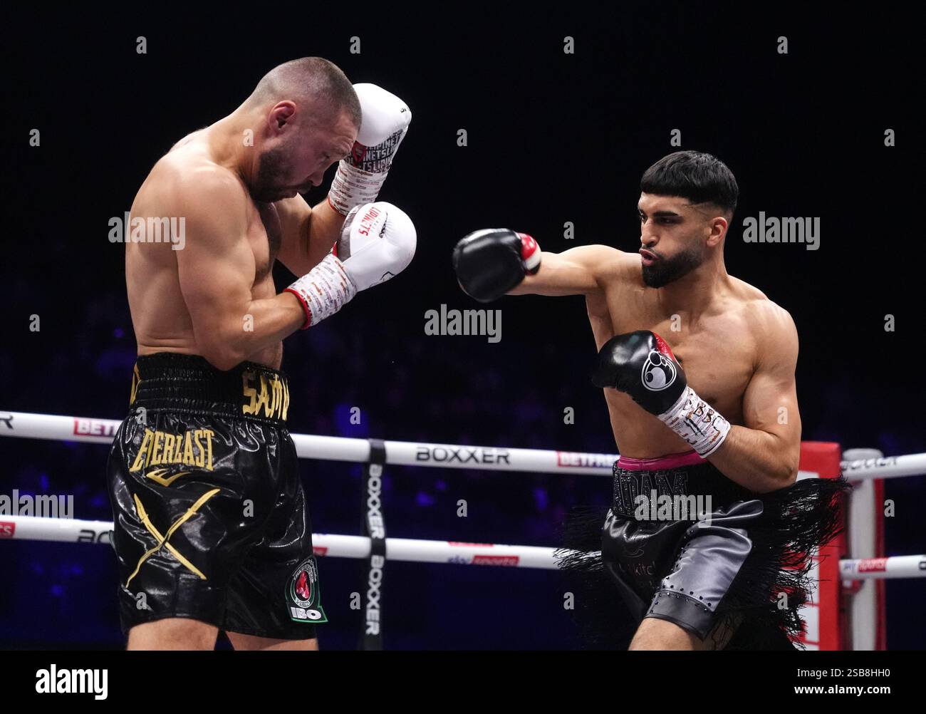 Adam Azim (right) and Sergey Lipinets in the IBO World Super Light ...