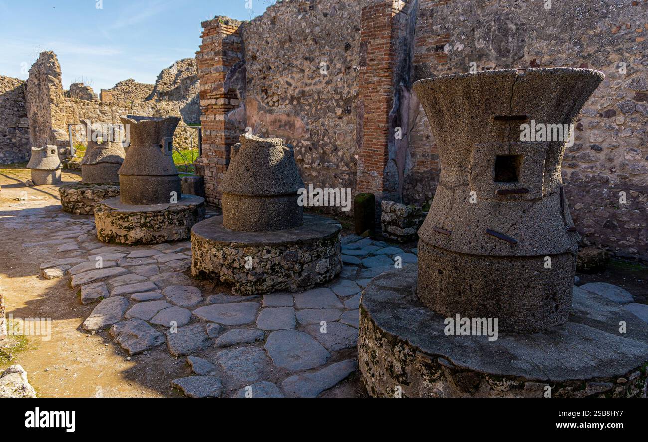 Overview of rotating stone mill for flour at the bakery in pompeii ...