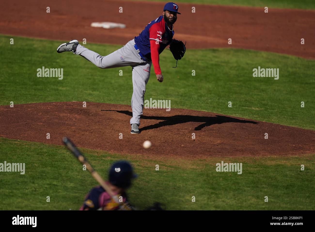 Dominican Republic's starting pitcher Johnny Cueto throws against Japan ...
